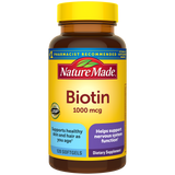 Nature Made Biotin 1000 mcg supplement bottle with Supports healthy skin and hair as you age, helps support nervous system function  benefit label with a yellow cap.